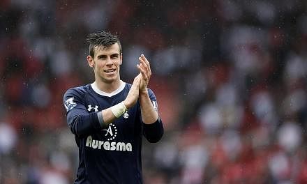 Tottenham Hotspur's Gareth Bale at the Britannia Stadium in Stoke-on-Trent, central England on Sunday, May 12, 2013. SingTel has announced on Friday, July 26, 2013, the new price plans for the upcoming season of the English Premier League (EPL) which