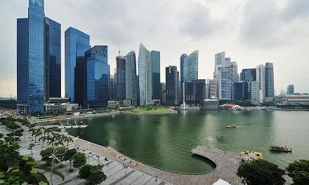 A sterling showing in the second quarter has made economists more upbeat over Singapore's full-year growth prospects, even as they expect slower growth from manufacturing. -- ST FILE PHOTO: ALPHONSUS CHERN