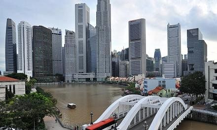 Singapore's economy grew 4.4 per cent in the final quarter of 2013 from a year ago, but expansion in key sectors moderated from the previous three months. -- ST FILE PHOTO: LIM YAOHUI&nbsp;