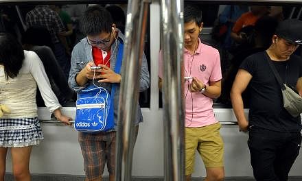 With mobile service disruptions the bane of working adults here, some users have called for operators to help one another out when there are outages, such as the five-hour one suffered by M1 users just last month. -- ST FILE PHOTO: KUA CHEE SIONG&nbs