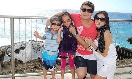 Her husband Lim Teck Wee (left, with their children in Hawaii two years ago).
