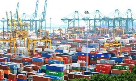 Singapore's non-oil domestic exports (Nodx) eased 4.6 per cent last month over the previous year, largely owing to a slide in electronic shipments which outweighed a rise in non-electric shipments. -- PHOTO: ST FILE
