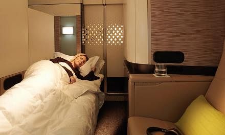 The Residence is a three-room suite that includes a living room and a double bed, while each First Apartment houses a lounge chair and a full-length ottoman that opens into a flat bed (above).&nbsp;--&nbsp;PHOTO: ETIHAD AIRWAYS