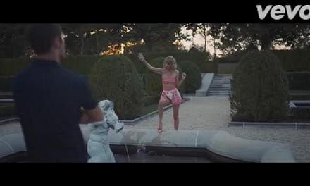 This cropped top with matching shorts shows off Swift's favourite girly style.&nbsp;-- PHOTO: TAYLOR SWIFT/YOUTUBE