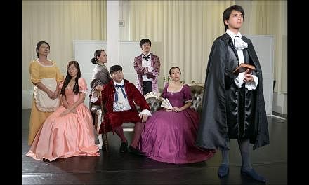 The cast of Tartuffe at a dress rehearsal (from far left) Jalyn Han, Jean Toh, Koh Wan Ching, Darius Tan, Neo Hai Bin, Mia Chee and Hang Qian Chou. -- ST PHOTO: DESMOND WEE