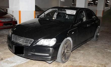 A car driven by a 34-year-old suspected drug trafficker, who was arrested in a CNB operation at Geylang on Feb 23, 2015. -- PHOTO: CNB