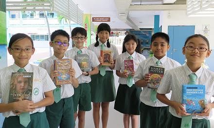 Casuarina Primary pupils who will be taking part in the preliminary round of the National Spelling Championship on Mar 7. (From left) They are Aisyah Shaik Ahmed Ally, Poh Zhi Nan, Soh Jue Ning, Charmaine Lee, Tan Qian Xun, Muhammad Daanish Zuklife a