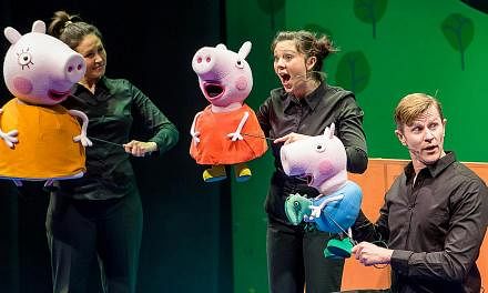 Bekki Adams (centre) plays the mud-loving Peppa Pig. -- PHOTO: BIZ TRENDS MEDIA