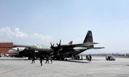A Republic of Singapore Air Force C-130 plane carrying medical staff and supplies landed at Kathmandu airport on Saturday, May 2, 2015. -- ST PHOTO: LIM YAN LIANG