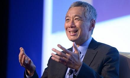 PM Lee has been commended for being "cool", "awesome" and "amazing" after posting on Facebook a source code he created to solve sudoku puzzles. -- ST PHOTO: LIM SIN THAI&nbsp;