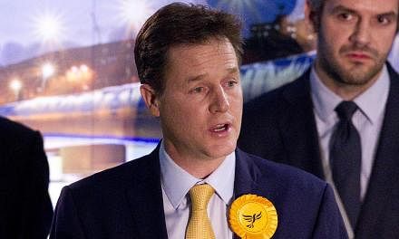 Liberal Democrat leader Nick Clegg speaking after retaining his seat in Sheffield, northern England, on May 8, 2015. -- PHOTO: AFP