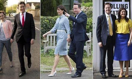 Left to right: Opposition Labour Party leader Ed Miliband and his wife Justine Thornton, leader of the Conservative Party David Cameron and his wife Samantha and leader of the Liberal Democrat party Nick Clegg and his wife Miriam Gonzalez Durantez vo