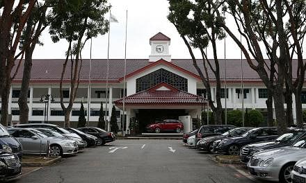 Jurong Country Club (JCC) has stepped in to freeze trading in its memberships, a day after it was announced that its 67ha property would be acquired and would make way for the high-speed rail terminus linking Singapore to Kuala Lumpur. -- ST PHOTO: O