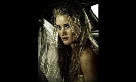 Rosie Huntington-Whiteley (above) and models playing the tyrant’s wives Abbey Lee and Courtney Eaton, with American actress Zoe Kravitz in Mad Max: Fury Road. -- PHOTO: GOLDEN VILLAGE