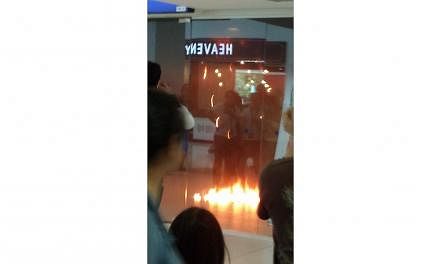 A POSB branch in Rivervale Plaza in Sengkang caught fire on Sunday afternoon.&nbsp;-- PHOTO: STOMP