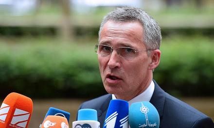 Nato head Jens Stoltenberg warned on Monday, May 18, 2015, that fighters from Islamic extremist groups may hide among the flood of migrants seeking refuge in Europe, increasing the need for an effective response. -- PHOTO: AFP