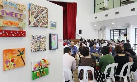 Some artwork from the Rainbow in the Dark project by the Singapore Association for the Visually Handicapped (SAVH) being featured at the tea session on Thursday, May 21, 2015. -- PHOTO: LIANHE ZAOBAO