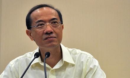 Mr George Yeo holding a press conference at the Ministry of Foreign Affairs on May 10, 2011, three days after his team lost the electoral battle in Aljunied GRC to the Workers' Party in the 2011 General Election. -- PHOTO: ST FILE