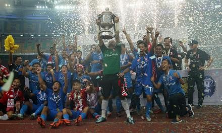 The LionsXII celebrating their Malaysia FA Cup victory after they defeated Kelantan 3-1 at the Bukit Jalil Stadium on Saturday night. -- ST PHOTO: NEO XIAOBIN&nbsp;