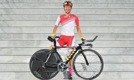 Singapore cyclist and 2013 SEA Games Gold medalist Dinah Chan, 29, has announced she is ready to defend her gold medal at the SEA Games next month.&nbsp;-- ST PHOTO:&nbsp;LIM YAOHUI FOR THE STRAITS TIMES