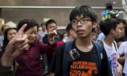 Hong Kong student activist Joshua Wong was barred from entering Malaysia at Penang Airport on Tuesday. -- PHOTO: REUTERS&nbsp;