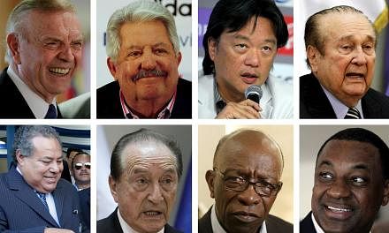 A combination photo showing eight of the nine football officials indicted for corruption charges in these file photos. From left to right: (top row) Jose Maria Marin, Rafael Esquivel, Eduardo Li, Nicolas Leoz; (bottom row) Julio Rocha, Eugenio Figuer