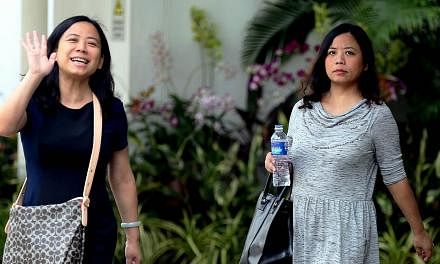 &nbsp; &nbsp;Tang Lei (left) and Tang Bei leaving the State Courts on Thursday, May 28. -- ST PHOTO: WONG KWAI CHOW&nbsp;