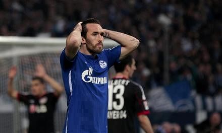 Christian Fuchs reacting during FC Schalke 04's Bundesliga first division soccer match against Bayer Leverkusen in Gelsenkirchen March 21, 2015. -- PHOTO: REUTERS
