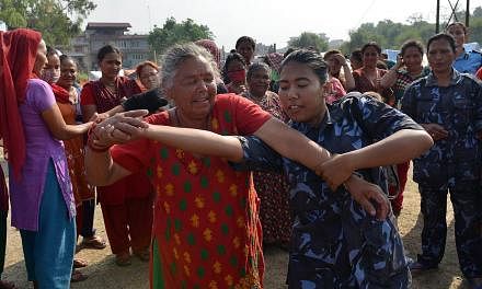 Nepal is teaching self-defence to quake-affected women and children following a string of attacks in temporary camps housing survivors, police said on Friday, June 5, 2015. -- PHOTO: AFP