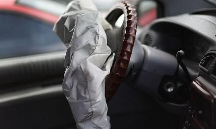 More than 75,000 vehicles in Singapore are affected by a worldwide recall caused by a potentially fatal flaw in the airbag system, the Land Transport Authority (LTA) revealed yesterday. -- PHOTO: AFP