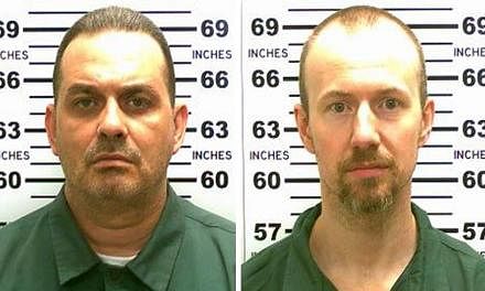 A United States manhunt for two convicted killers, Richard Matt (left), 49, and David Sweat, 35, who cut their way out of a maximum-security jail Hollywood-style on Tuesday stretched into a fourth day as investigators focused on whether they were hel