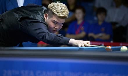 Singapore's Aloysius Yapp, the reigning world Under-19 pool champion, crashed out of the SEA Games 9-ball event after losing in the quarter-finals on June 9, 2015. -- ST PHOTO: KUA CHEE SIONG