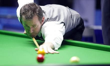 Gilchrist (pictured), who has already won the English billiards singles (500) and English billiards singles titles in this SEA Games, will try to complete his hat-trick in the English billiards team event on Wednesday. -- PHOTO: ZAOBAO