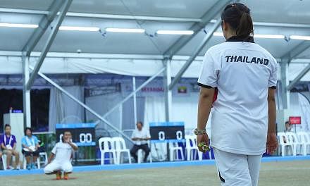 Thailand affirmed their status as South-east Asia's petanque powerhouse by clinching their third gold on June 9, 2015. -- ST PHOTO: JEREMY LIM