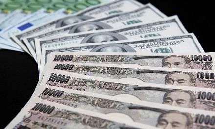 The Japanese yen surged against the dollar and the euro on Wednesday after the head of the Bank of Japan said a further slide in the Japanese currency was "unlikely". -- PHOTO: BLOOMBERG