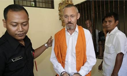 New Zealander Antony de Malmanche arrives for a trial over drugs possesion at Denpasar district court in Bali, Indonesia on June 11, 2015. -- PHOTO: EPA
