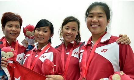 The Women's Team take bronze at the SEA Games squash victory ceremony at the Kallang Squash Centre Court. - ST PHOTO: KUA CHEE SIONG&nbsp;