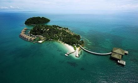 Cambodia's Song Saa Private Island (above) spans two islands in the Koh Rong Archipelago.