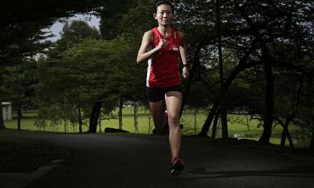 Neo Jie Shi, a marathoner for the Olympic Games, runs in a park near Jurong SAFRA where she trains. She is the first female marathoner since Yvonne Danson at the 1996 Atlanta Games.