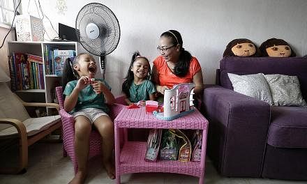 Madam Siti Zubaidah, who lives in Tampines, says she will avoid taking outdoors her daughters Amelia Shasmeen Azman (left), six, and Alisha Mia Shafana Azman, four.