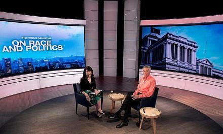 PM Lee with Mediacorp's Debra Soon at the TV recording for The Prime Minister On Race And Politics, which was broadcast last night. He says that although all voters say they will vote for the best candidate, "that definition differs depending on whic