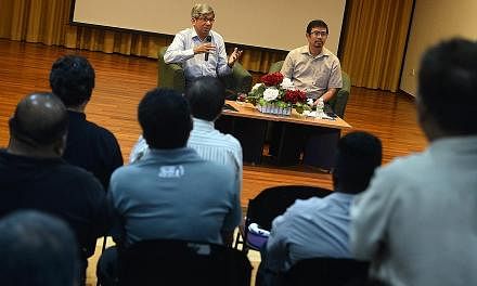 Dr Yaacob (left) and Mr Zainal at the dialogue with unionists at Mendaki's premises in Siglap yesterday. Dr Yaacob said it was important to ensure the presidency is held by people from all the major races from time to time as the president is a symbo