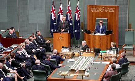 Australian lawmakers listening as Prime Minister Lee Hsien Loong delivered a historic address to the Australian Parliament yesterday.