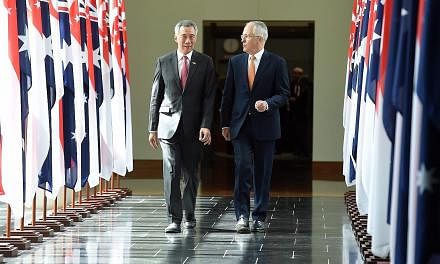 PM Lee leaving Australia's Parliament House with Australian Prime Minister Malcolm Turnbull after his historic address yesterday. Mr Lee said the shared history, outlook and ethos between Singapore and Australia have formed the foundation of a "deep,