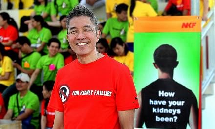 Mr Edmund Kwok at a healthy lifestyle walk organised for NKF staff. He often promoted sporting activities as a fund-raising platform and to encourage patients to lead healthier lives.
