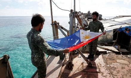 Philippine marines aboard a station in the disputed Spratly Islands in the South China Sea. Philippine President Rodrigo Duterte has declared the Philippines' "separation" from the US and said Beijing and Manila could "appropriately handle disputes". 