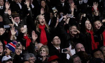 The audience cheering during the Make America Great Again! Welcome Celebration for Mr Trump at the Lincoln Memorial on Thursday that was anchored by country music veterans.