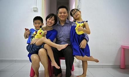 Above: Mr Chua, his wife Angel and their son Ace. As a result of their three-year stay in Dubai, Ace had to catch up on his studies and get used to a "different culture" in school here upon their return. Left: Mr Toh, his wife Melissa and their son N