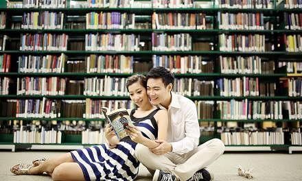 Mr Wu Weiquan and Ms Constance Ho, in a snapshot taken in 2013 during their wedding photo shoot at the NUS central library.