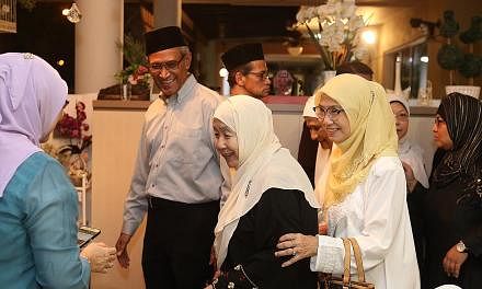 Among those at Mr Othman's wake yesterday were his daughter Lily Othman (far left), former senior minister of state Zainul Abidin Rasheed and Puan Noor Aishah.